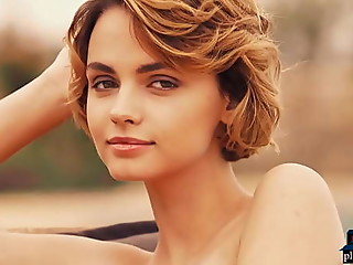 Tiny redhead teen hottie takes off her bikini and shows off